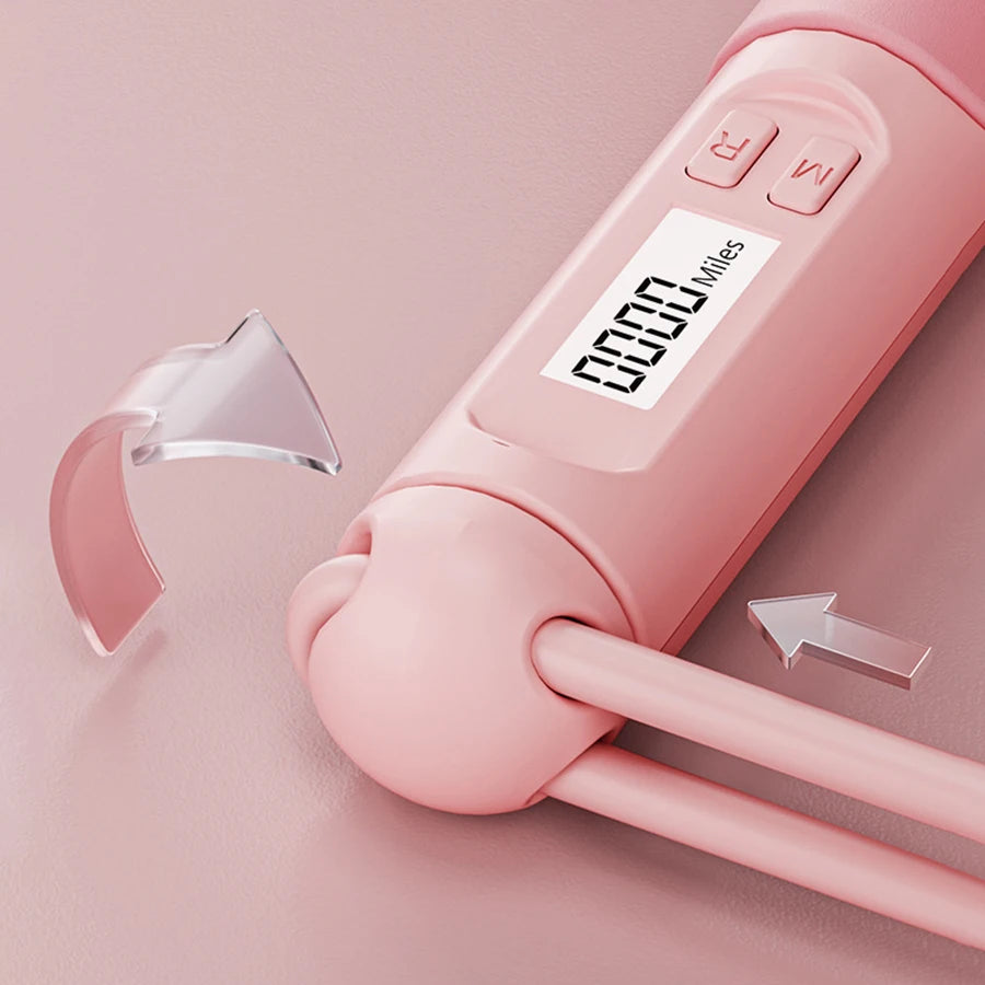 Smart jump rope with digital counter in pink showing distance on LCD screen