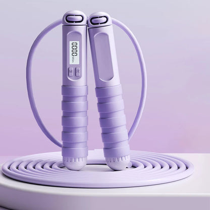 Smart jump rope with digital counter in light purple with ergonomic handles and LCD display
